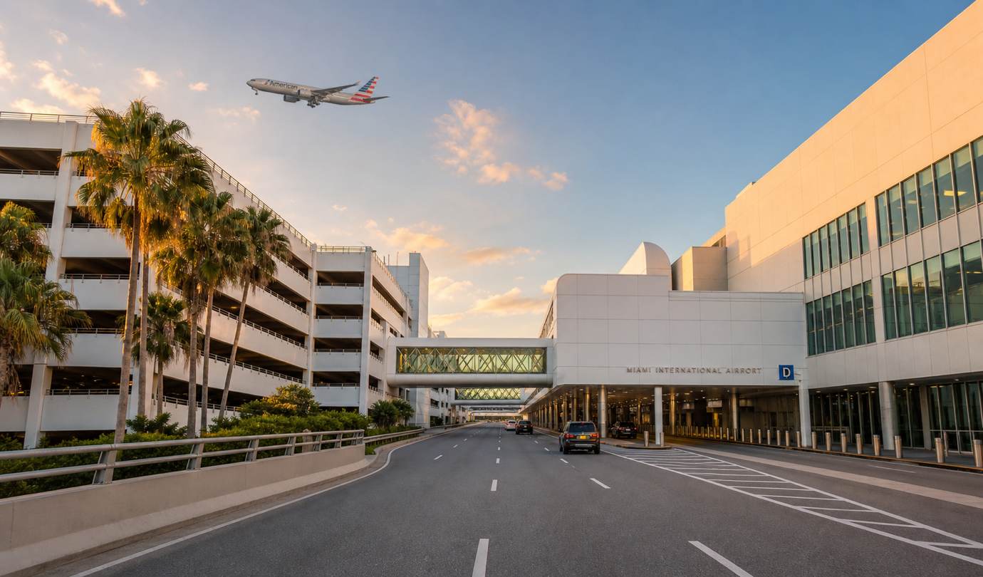 Miami airport parking - MIA terminal frontage, parking garage and departures roadway at Miami International Airport at sunset